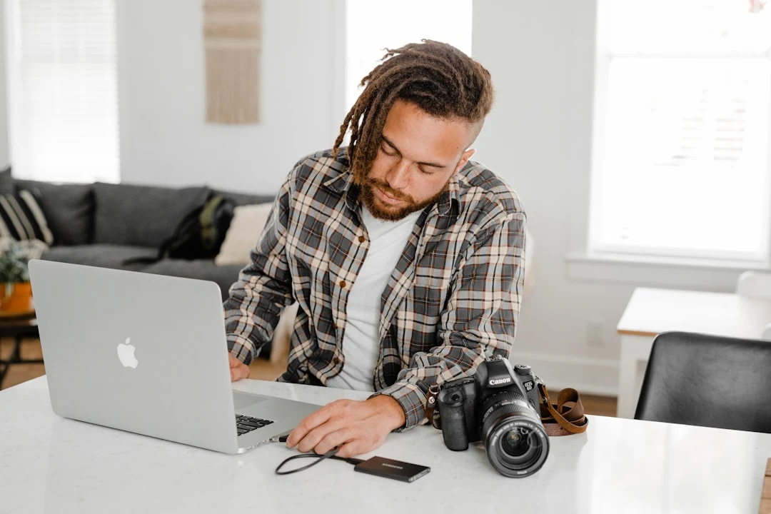 photographer on a Zoom video call running an in-person sales ordering session with a client