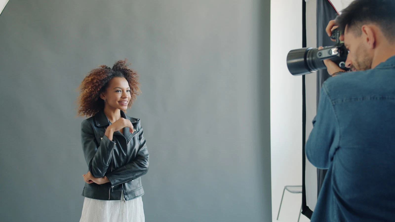 Photographer working in studio during behind-the-scenes session