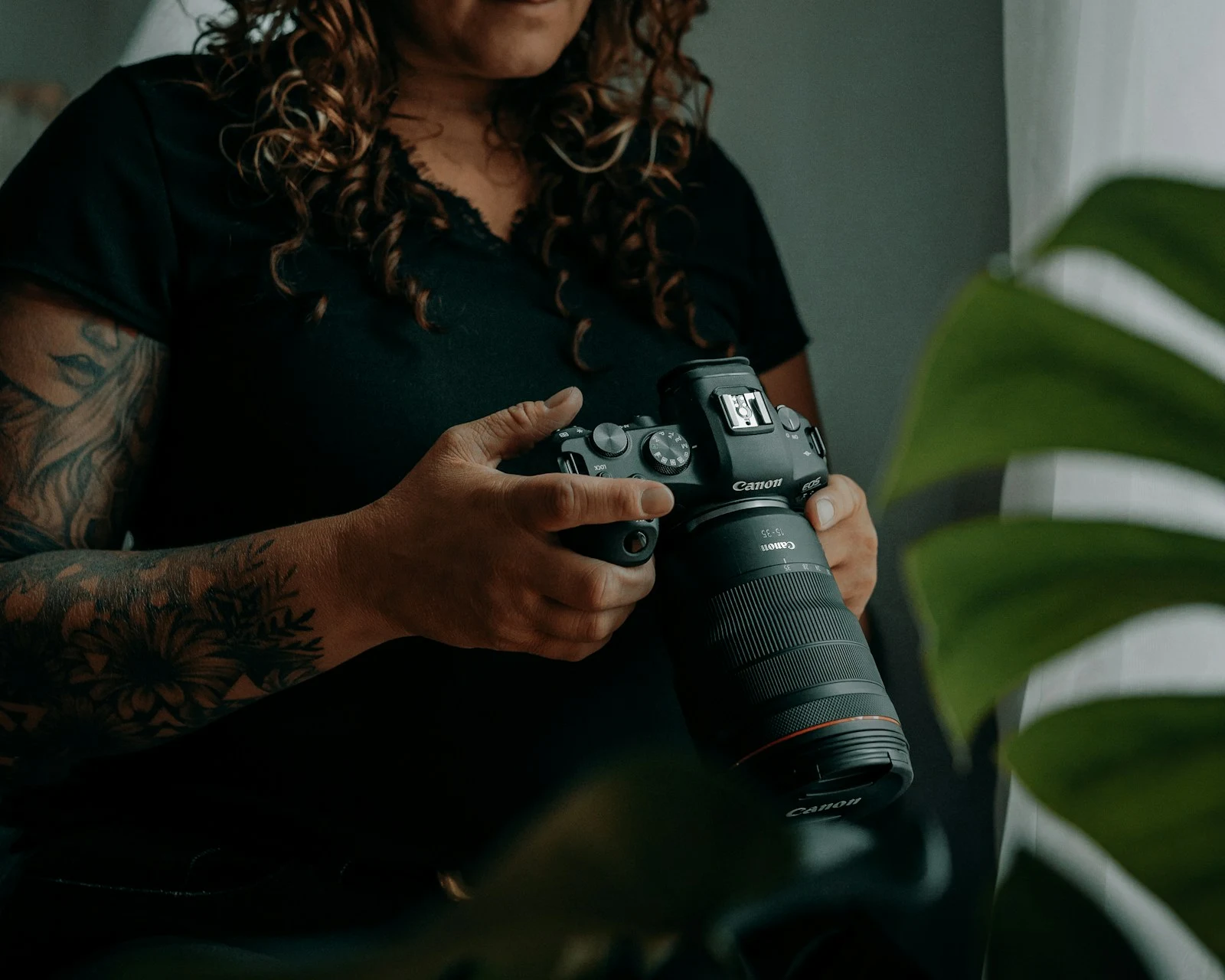 Photographer creating social media content with camera