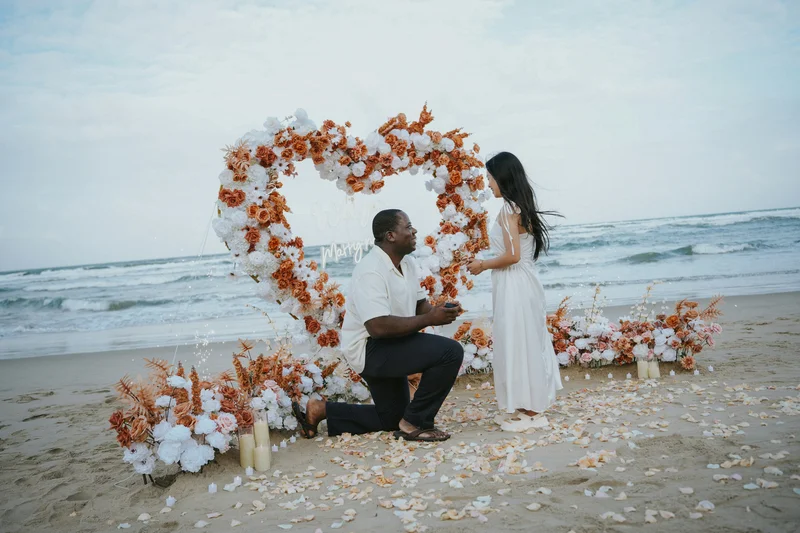 Engaged couple planning their wedding together online