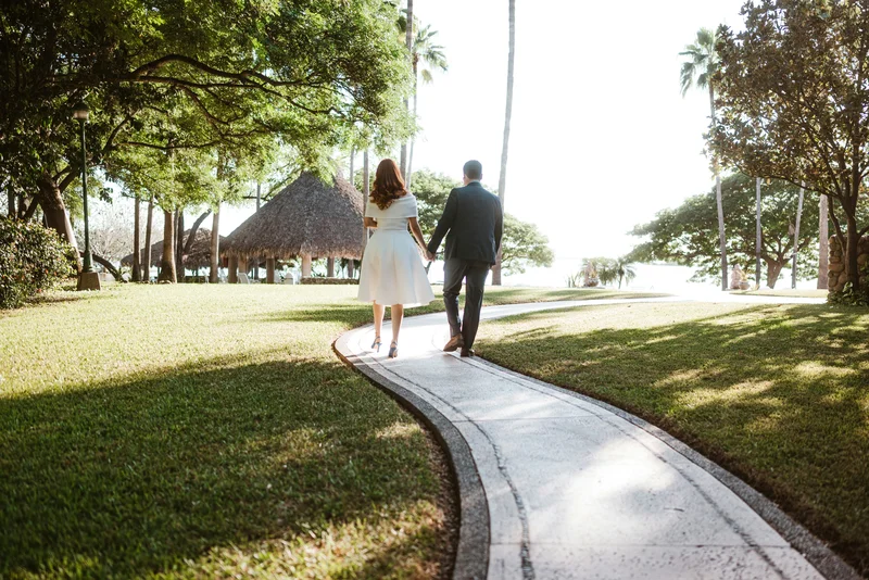 Wedding couple photographed at outdoor venue